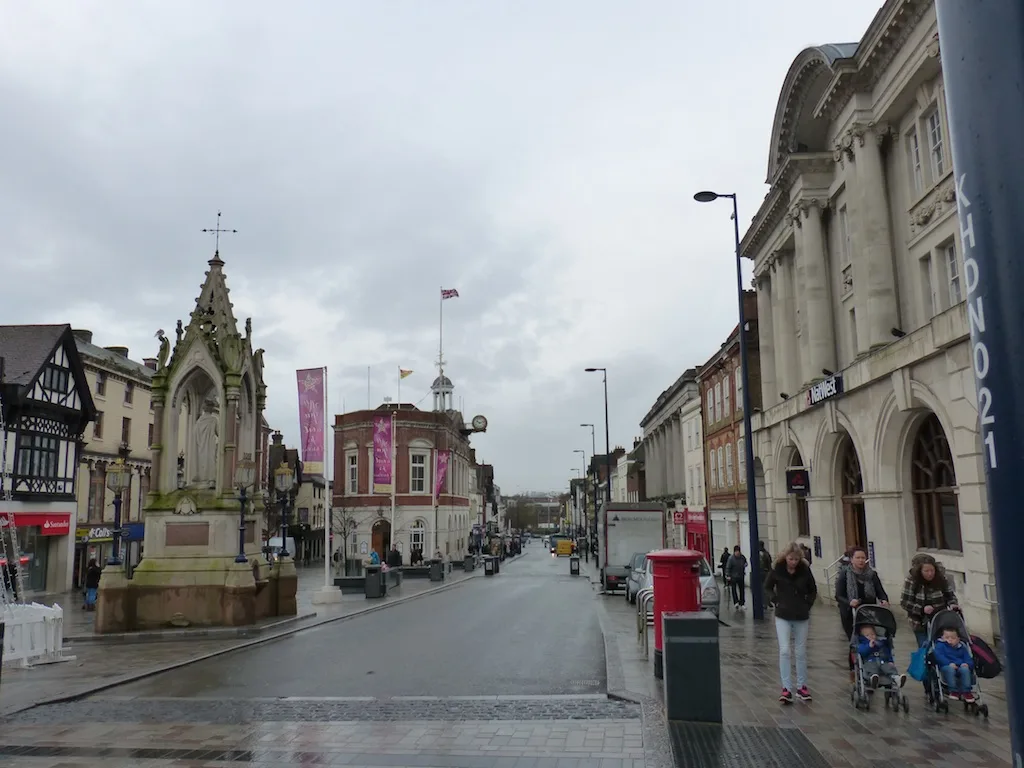 Maidstone High Street with the Town Hall at centre. Jubilee Square, where the lights are switched on, is the open space beside it